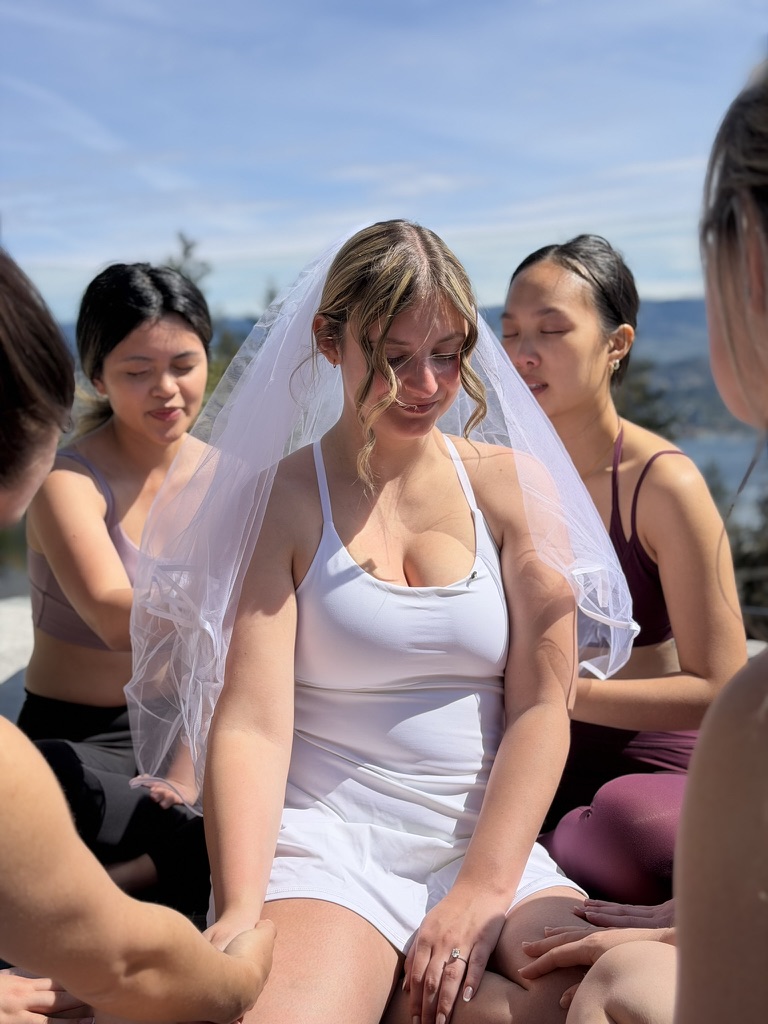 bride meditating at bachelorette yoga party kelowna okanagan