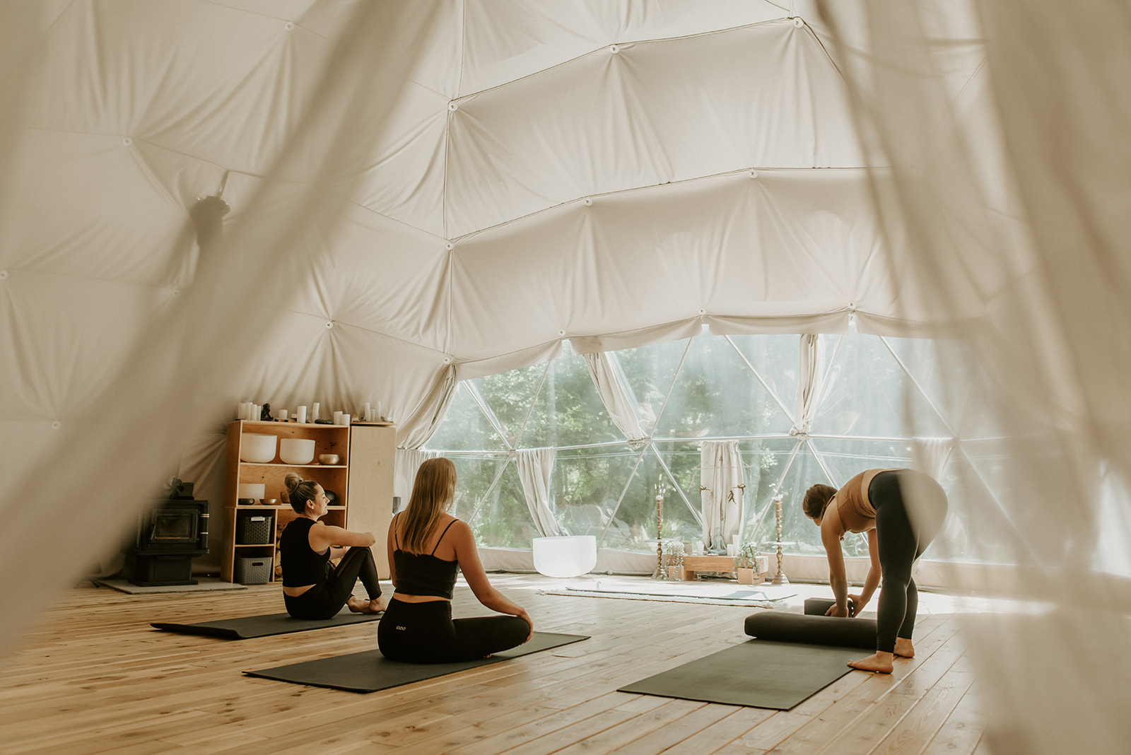 Yoga class inside geodesic dome Bowen Island BC retreat near Vancouver